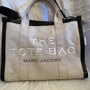 MARC JACOBS AUTHENTIC THE TOTE BAG LARGE in cavas off white and black trim.